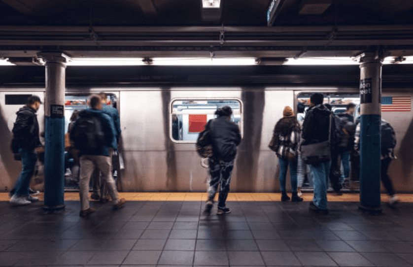 People waiting on the NYC subway platform